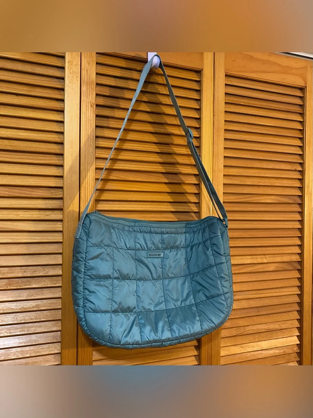 Reebok: Quilted crossbody bag with adjustable strap | See description